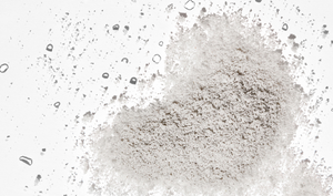 Grey Powder product scattered on white background